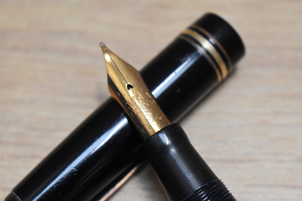 A Mabie Todd & Co Swan 2060 leverless twist fill fountain pen in black with one broad and two narrow - Image 2 of 3