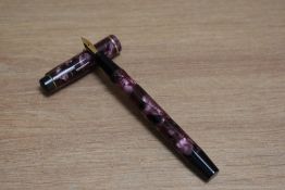 A De La Rue Onoto the Pen 5601/B8 plunger fill fountain pen in rose marble with one narrow band to