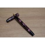 A De La Rue Onoto the Pen 5601/B8 plunger fill fountain pen in rose marble with one narrow band to