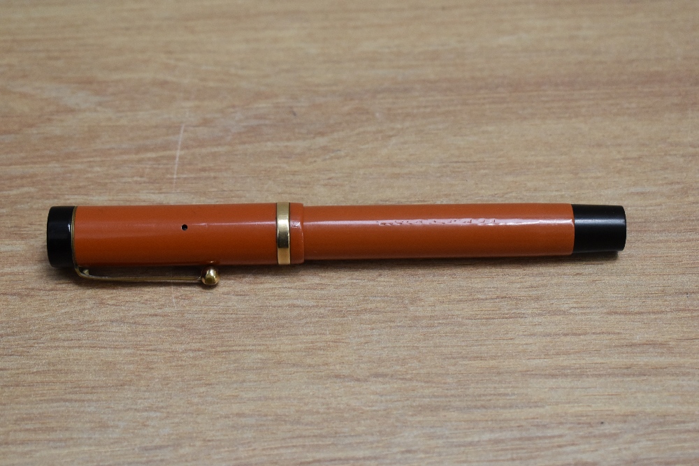 A Parker Duofold Lucky Curve Senior button fill fountain pen in orange with raised band to the cap - Image 3 of 3