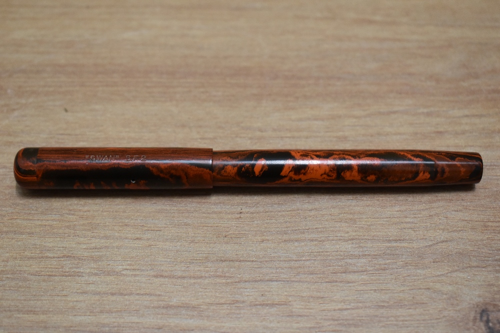 A Mabie Todd & Co Swan Self Filling lever fill fountain pen in black and red hard rubber with - Image 3 of 3