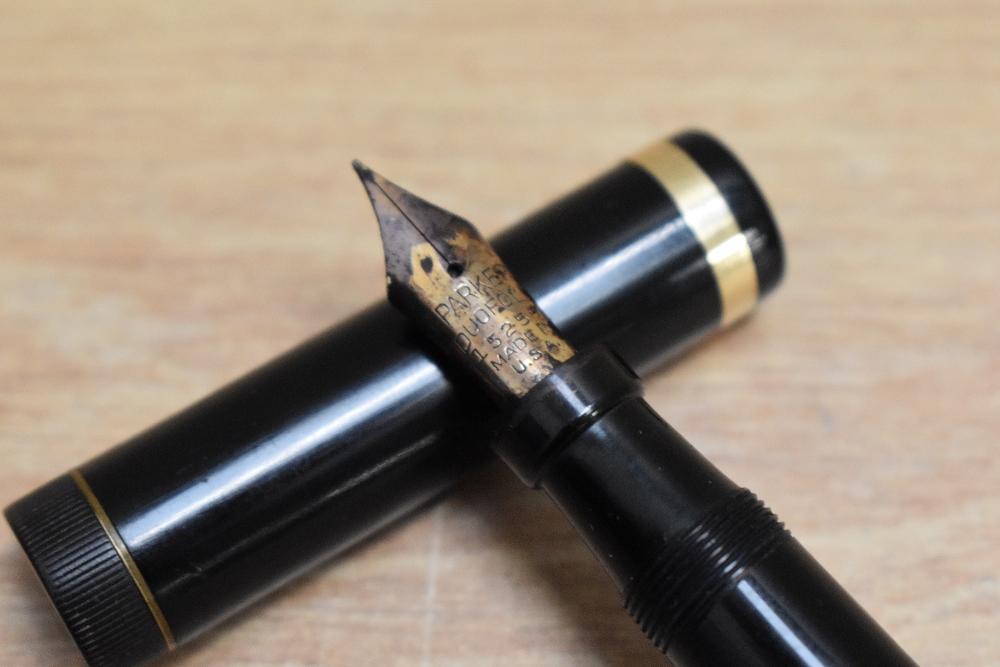 A Parker Duofold Senior button fill fountain pen in black with single band to the cap having - Image 2 of 3