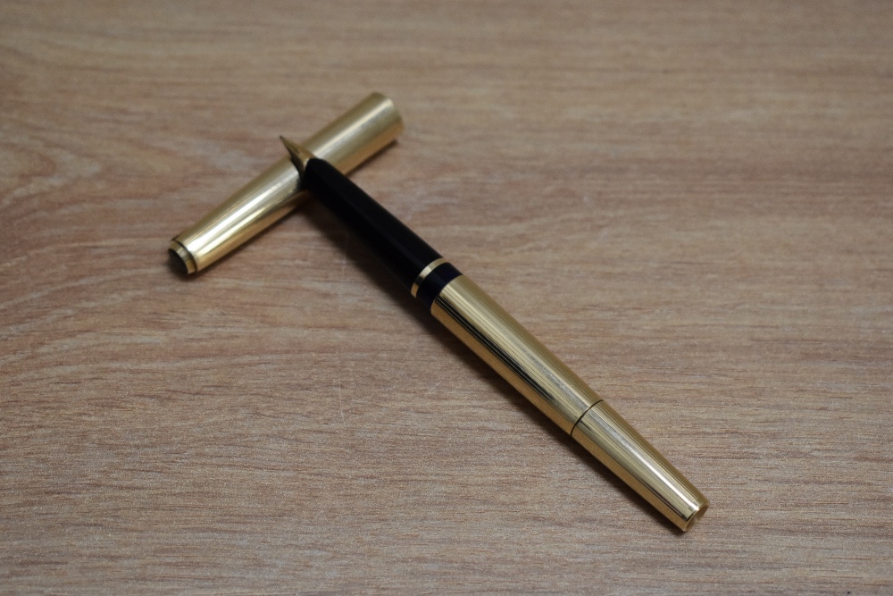 A Pelikan M60 Rolled gold plunger fill fountain pen, ballpoint pen and mechanical pencil set. - Image 2 of 3