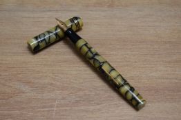 A Mabie Todd Swan Self Filler Eternal 46 lever fill fountain pen in Inlaid Pearl 46 with two