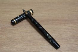 A De La Rue Onoto the Pen 6234/39 plunger fill fountain pen in green black marble with a broad