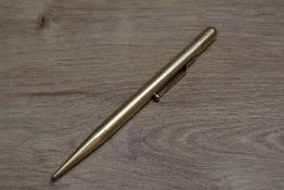 A Mabie Todd & Co Fyne Poynt propelling pencil in yellow metal.