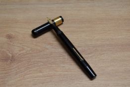 A Mabie Todd & Co Swan SF2 lever fill fountain pen in chaised black hard rubber with broad gold band
