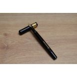 A Mabie Todd & Co Swan SF2 lever fill fountain pen in chaised black hard rubber with broad gold band