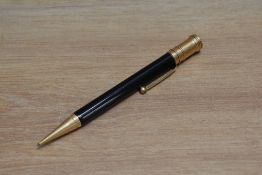 A Parker Duofold Senior propelling pencil in black. Engraved