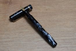 A Mabie Todd & Co Swan self filler lever fill fountain pen in blue black marble with two narrow
