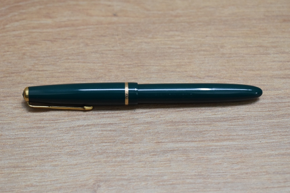 A Parker Slimfold aero fill fountain pen in green with narrow decorative band to the cap having - Image 3 of 3