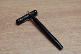 A Mabie Todd & Co Swan SF1 lever fill fountain pen in chaised black hard rubber having Mabie