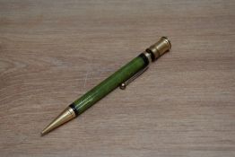 An early Parker Duofold Senior propelling pencil in jade green. Some wear