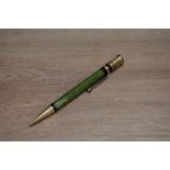 An early Parker Duofold Senior propelling pencil in jade green. Some wear