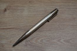 A Mabie Todd & Co Fyne point propelling pencil in sterling silver with engine turned barrel