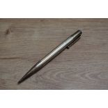 A Mabie Todd & Co Fyne point propelling pencil in sterling silver with engine turned barrel