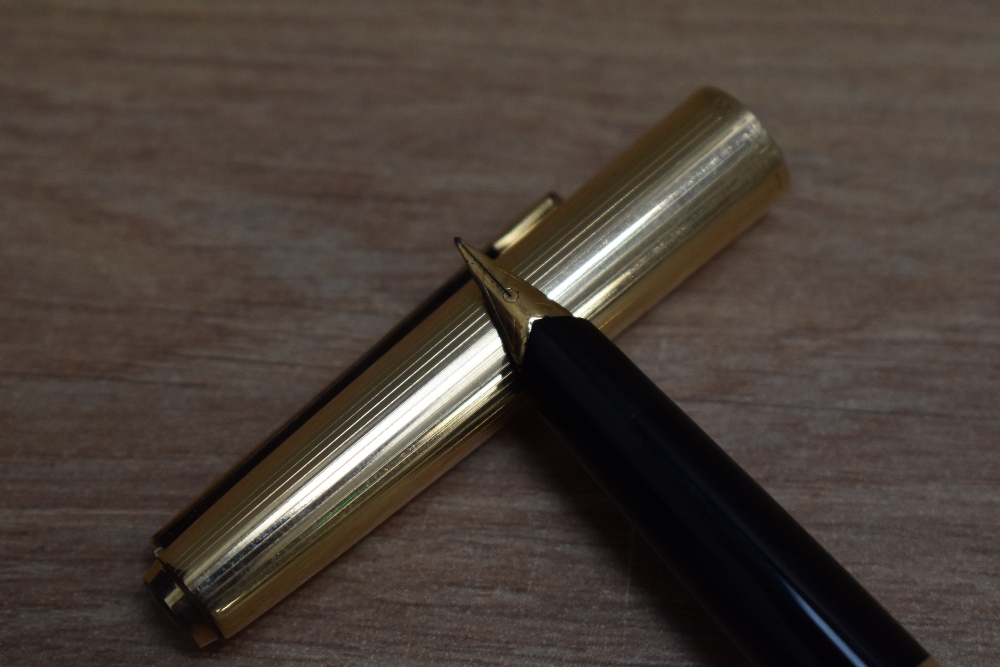 A Pelikan M60 Rolled gold plunger fill fountain pen, ballpoint pen and mechanical pencil set. - Image 3 of 3