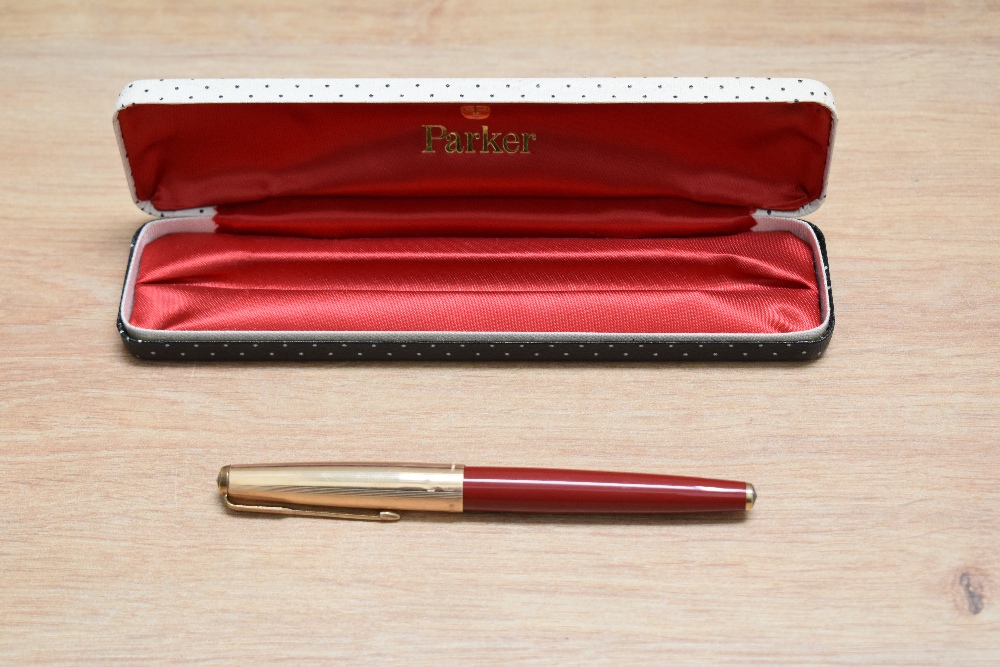 A Parker 65 capillary fill fountain pen in red with rolled gold cap. Boxed - Image 3 of 3