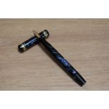 A De La Rue Onoto the Pen 6235/39 plunger fill fountain pen in blue black marble with one broad