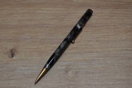 A Mabie Todd & Co Fyne Poynt propelling pencil in black pearl. Small marks to twist top