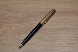 A Parker 61 propelling pencil in black with rolled gold cap