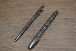 A Sheaffer Imperial Sovereign aerometric fill fountain pen and propelling pencil set in Sterling