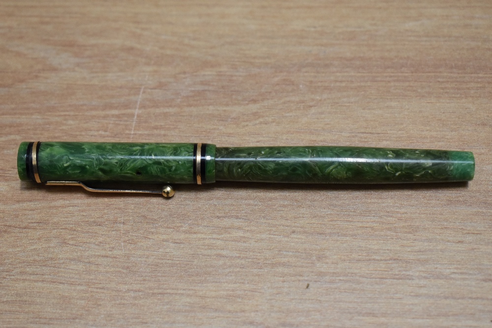 A Mabie Todd Swan Self Filler 142 50 lever fill fountain pen in jade green with gold in black band - Image 3 of 3