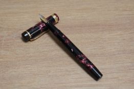 A De La Rue Onoto the Pen 6234/97 plunger fill fountain pen in rose black marble with a broad band