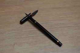 A Mabie Todd & Co Swan eye dropper fountain pen in Black Hard Rubber with gold filled band to the