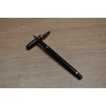 A Mabie Todd & Co Swan eye dropper fountain pen in Black Hard Rubber with gold filled band to the
