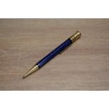 An early Parker Duofold propelling pencil in lapis lazuli blue with white flecks. Clip is rubbed