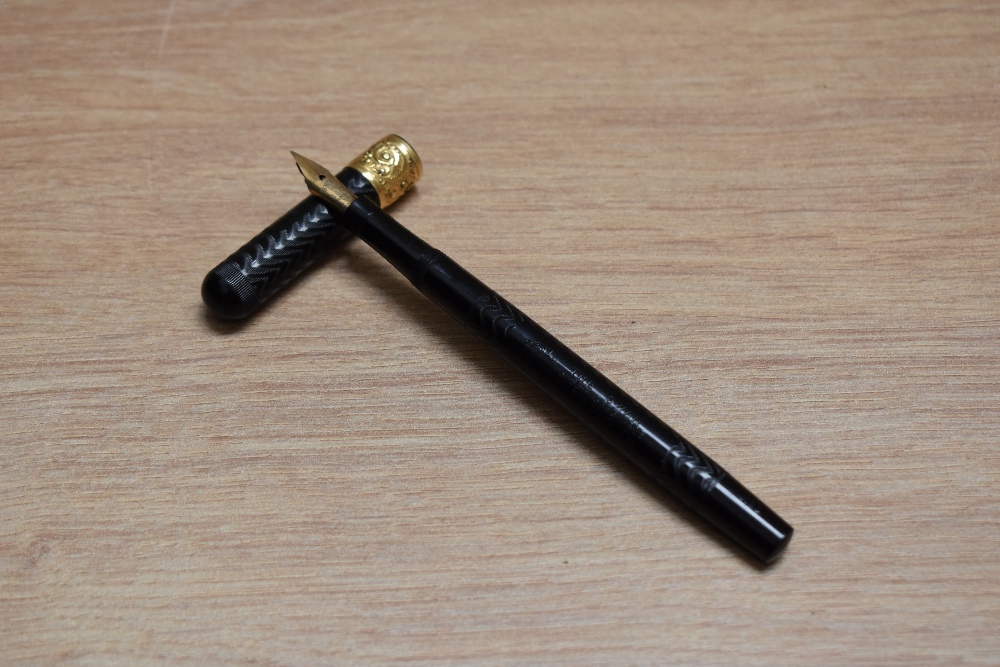 A Mabie Todd & Co Swan 2 Safety Screw cap eye dropper fountain pen in Chaised Black Hard Rubber with