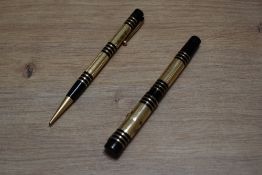 A Mabie Todd & Co Swan 275/60 leverless twist fill fountain pen and Fyne Poynt propelling pencil set