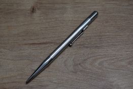 A Mabie Todd & Co Fyne Poynt silver coloured propelling pencil.