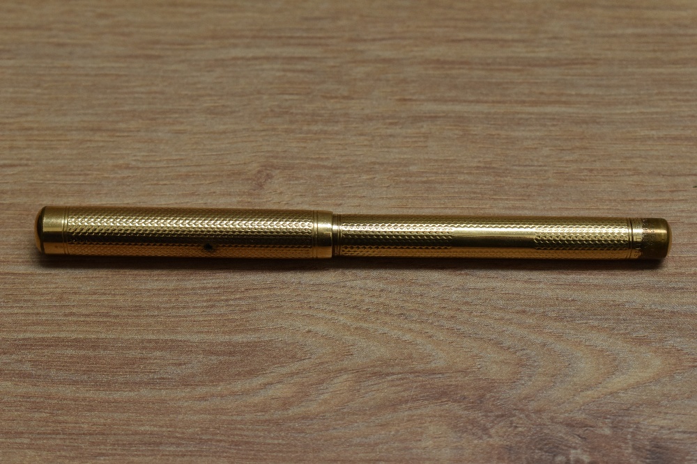 A Mabie Todd & Co Swan 2 eye dropper fountain pen in engine turned yellow metal having Mabie - Image 3 of 3