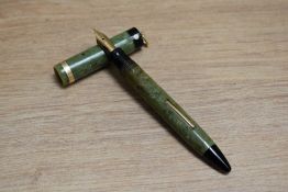 A Sheaffer Lifetime Flat top lever fill fountain pen in jade green with white spot, ring top and