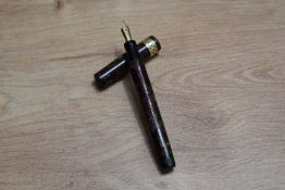 A Mabie Todd & Co Leverless (type 3)twist fill fountain pen silver and wine with broad pierced