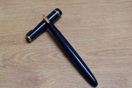 A Parker Duofold Junior aero fill fountain pen in blue with narrow decorative band to the cap having