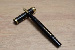 A Mabie Todd & Co SF E444 Eternal lever fill fountain pen in black hard rubber with broad ribbed