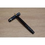 A De La Rue Onoto the Pen 5600/68 plunger fill fountain pen in grey marble and lower part of