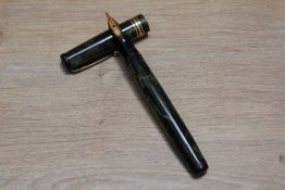 A Mabie Todd & Co Swan L445/60 leverless twist fill fountain pen in green marble with one broad
