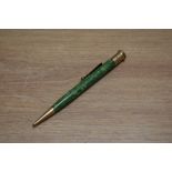 A Mabie Todd Swallow style propelling pencil in jade green