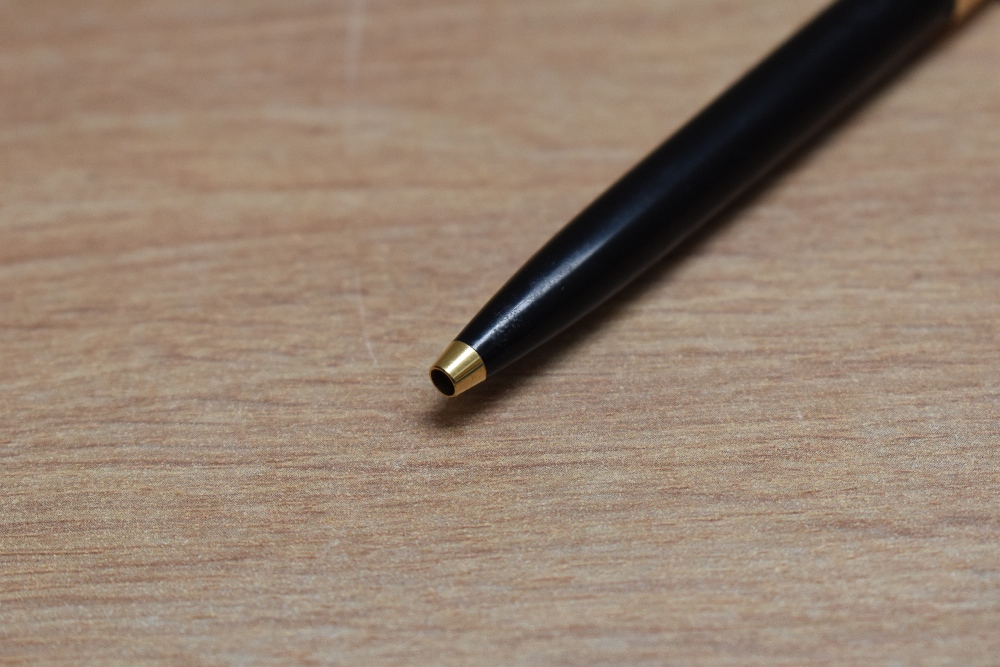 A Parker 65 ballpoint pen in black with rolled gold cap - Image 2 of 2