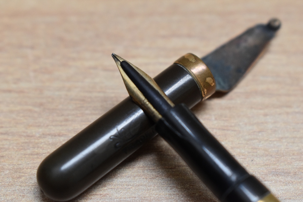 A Mabie Todd & Co Swan eye dropper fountain pen in Black Hard Rubber with gold filled band to the - Image 2 of 3