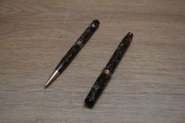A Mabie Todd & Co Swan Visofil ladies fountain pen and Fyne Point propelling pencil set in multi