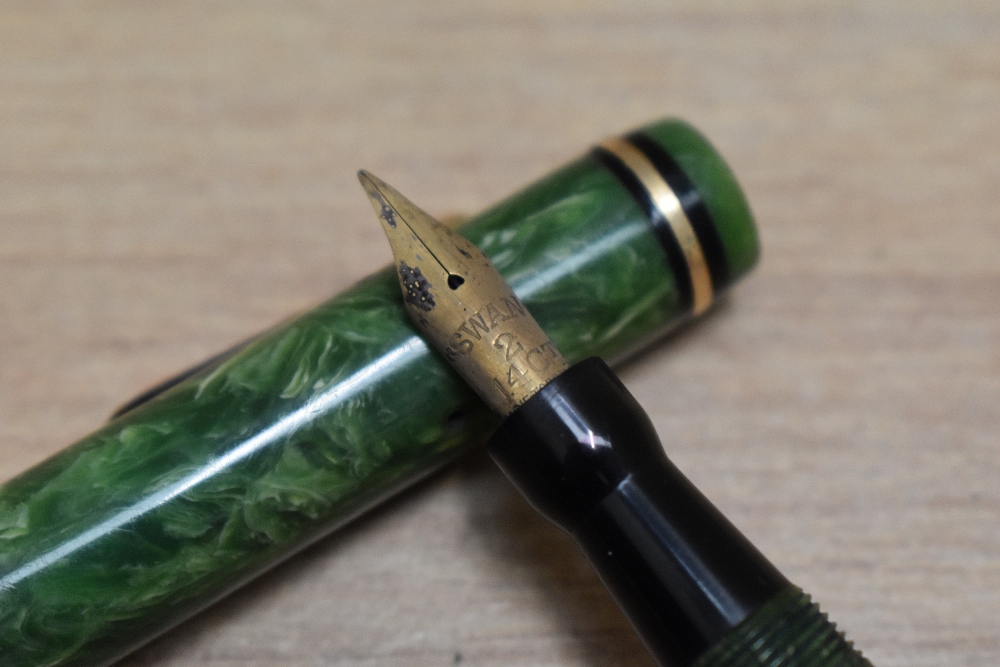 A Mabie Todd Swan Self Filler 142 50 lever fill fountain pen in jade green with gold in black band - Image 2 of 3