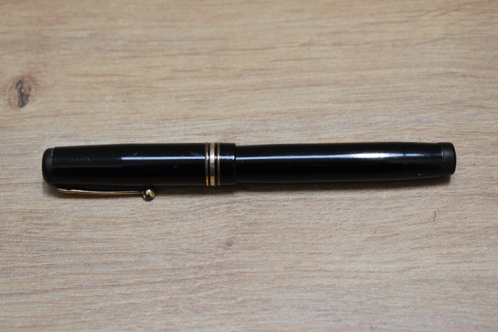 A Mabie Todd & Co Swan 2060 leverless twist fill fountain pen in black with one broad and two narrow - Image 3 of 3