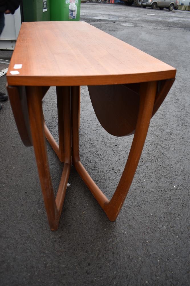 A vintage teak drop leaf table of stylised design, McIntosh style, labelled beithcraft furniture - Image 3 of 3