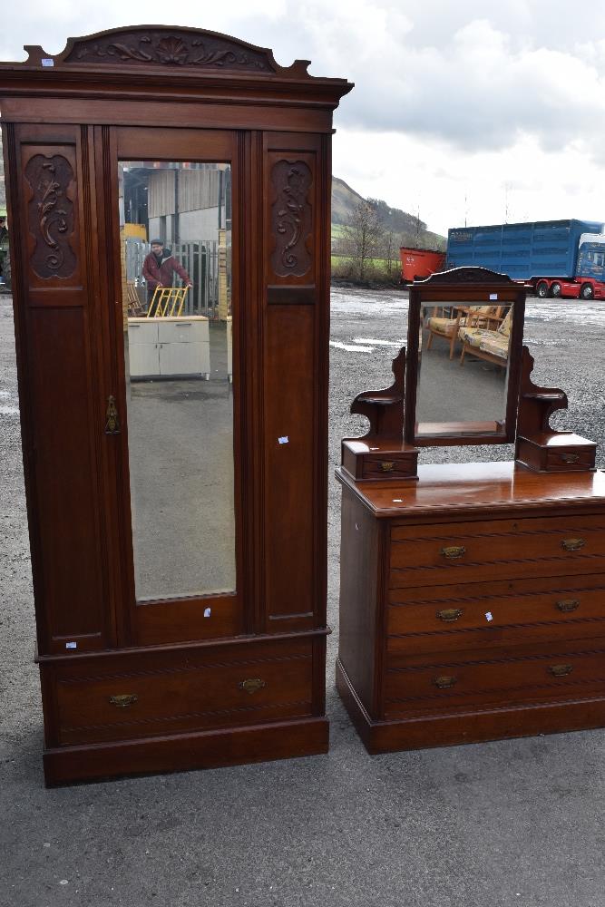 A Victorian mahogany mirror door wardobe and dressing table