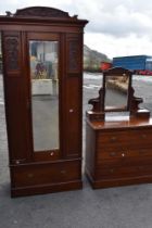 A Victorian mahogany mirror door wardobe and dressing table